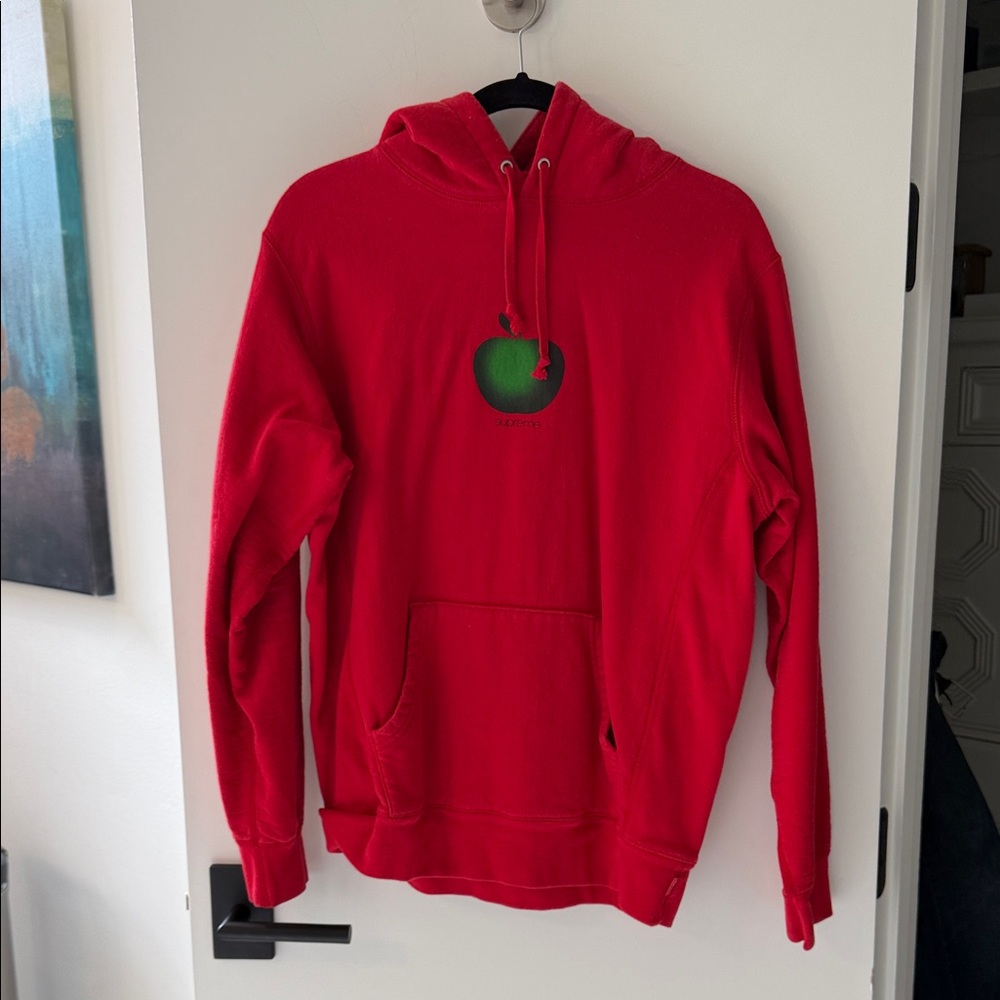 Supreme Red Hoodie with Green Apple Graphic